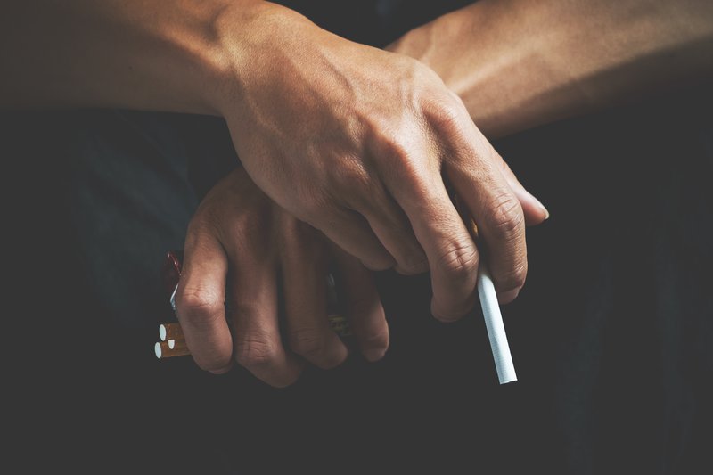 cigarette-addiction-tobacco-nicotine-smoke-unhealthy-danger-bad-narcotic-habit-white-filter-health-risk-cancer-illness-quit-stop-toxic-drug-lifestyle-concept-pack-hand.jpg