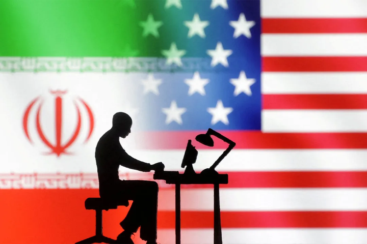 iran-usa-flag-behind-hacker-shadow